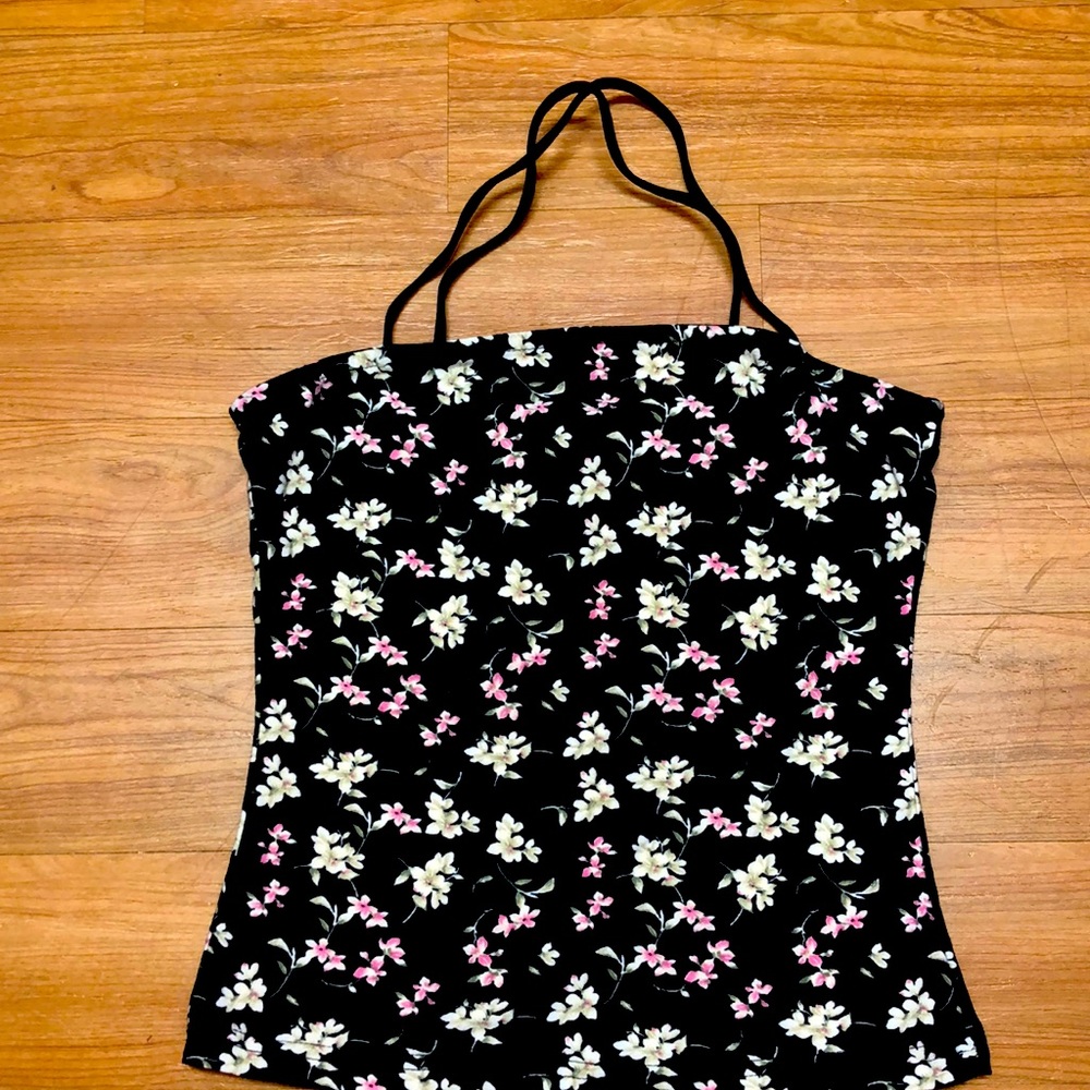 Size small tank top that cross crosses in the back